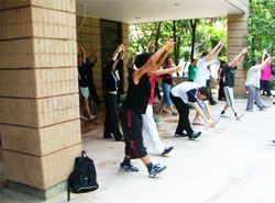 People practiced Tai Chi, in parks, on street corners and squeezed onto balconies