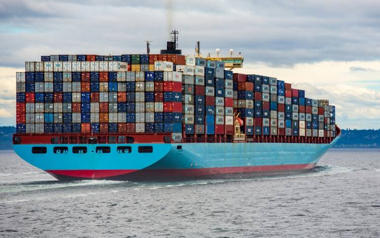  blue and red shipping containers on ship