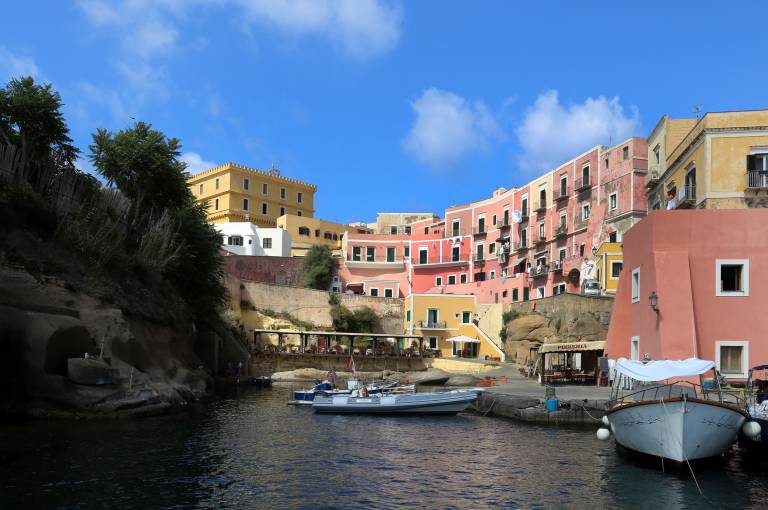 Photograph of the colourful port on the island of Venetone in Italy