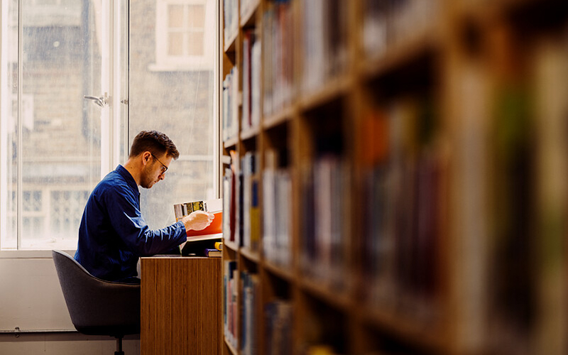 A student working in The Bartlett Library