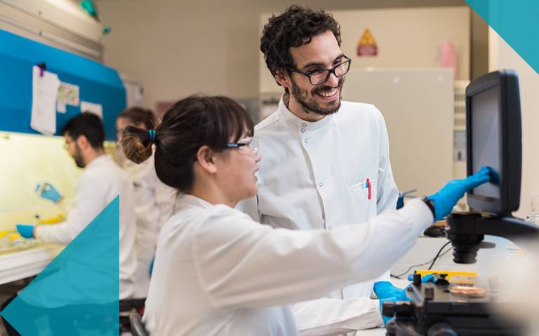 Biochemical Engineering researchers in laboratory at computer 