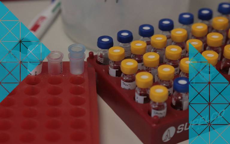 Red tray with vials of medicine