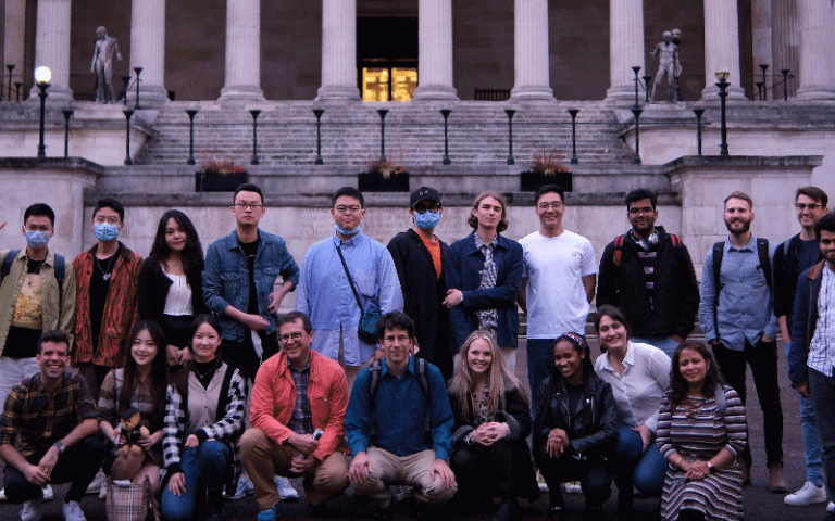 Group image of MSc in Global Management of Natural Resources students and staff by the UCL Portico
