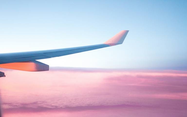 airplane wing and sky - S O C I A L . C U T at unsplash.com