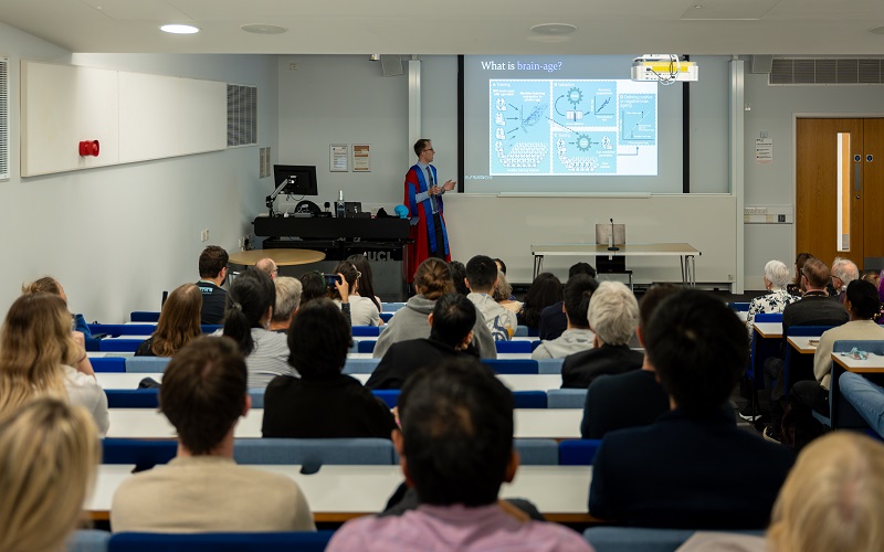 A photo of James Cole presenting in his inaugural lecture