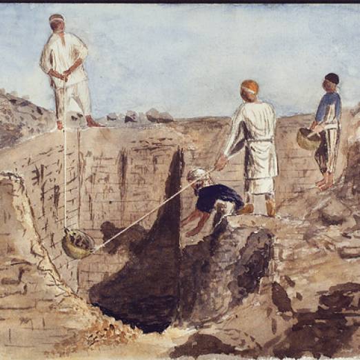 Watercolour painting showing a group of men in loose, often white clothing working with tools on an Egyptian archaeological dig