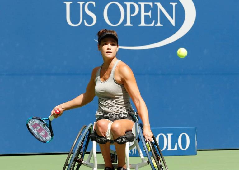 Dana Mathewson playing professional wheelchair tennis