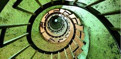 looking up inside a spiral staircase