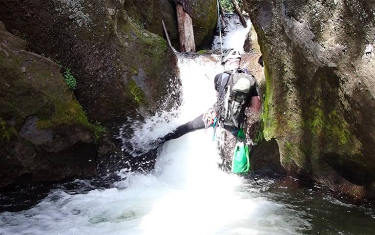 Dr Jesse Zondervan (UCL Earth Science) rappels down Duwee Falls on Munson Creek, Crater Lake National Park, OR, USA.