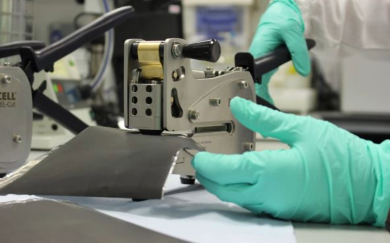 Researcher using lab equipment