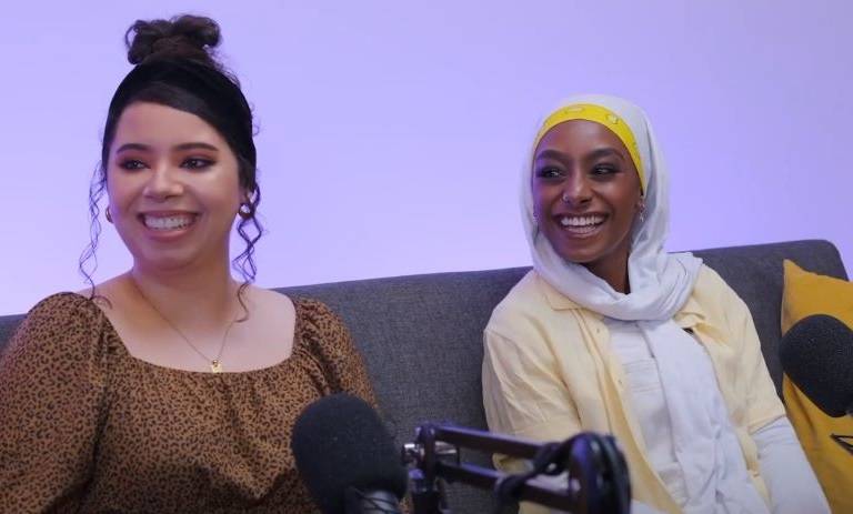 Photograph of the two podcast presenters hosting an episode, Shakira Crawford and Iman Issa-Ismail