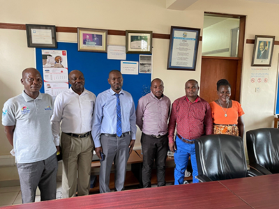 Health facility managers from the NIHR-funded MOCCA study in Uganda (L-R John Omong, from Kisugu HC III; Robert Nkalaba, from TASO Mulago; Dr. Kisuze Geoffrey, from Ndejje HC IV; Tibatta Eddy, from Kiswa HCIII; Lukwago Issa Kiggundu from Wakiso HCIV; Acha