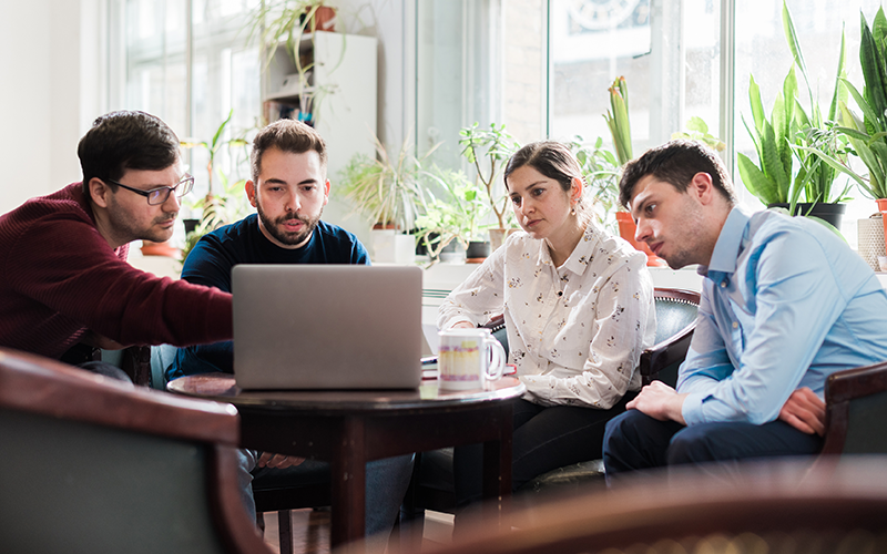 Peeople meeting with laptop