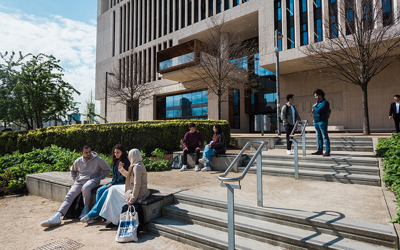 students outside building