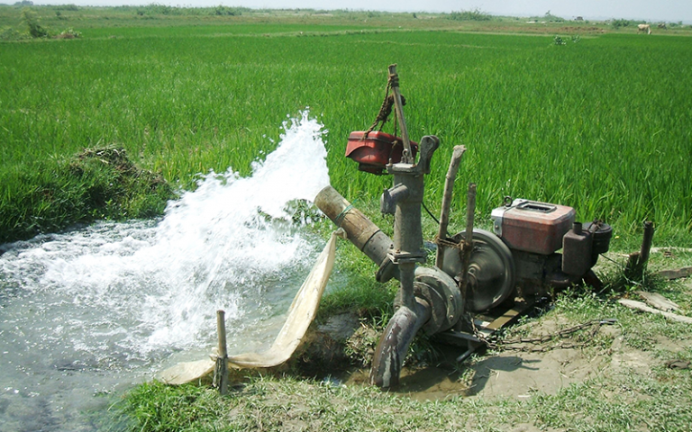 A diesel-powered irrigation well pumping groundwater to dry-season Boro rice fields located in the Brahmaputra floodplain in north-central Bangladesh