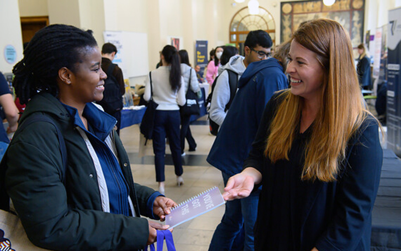 Photo of a mechanical engineering student attending a careers fair