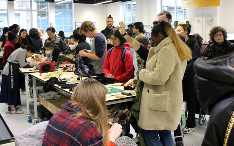 Photo of the workshop very busy with people