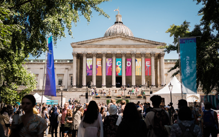 A photo of UCL's iconic Portico Building decorated with a welcome banner