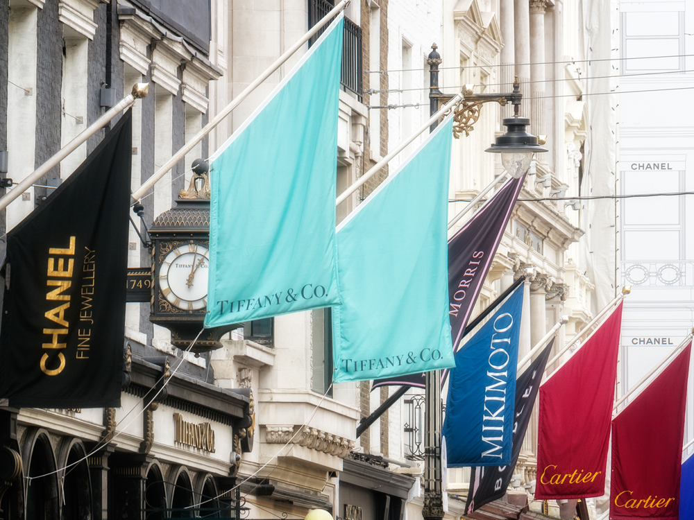 Exclusive Shopping In New Bond Street Showing Store Flags For