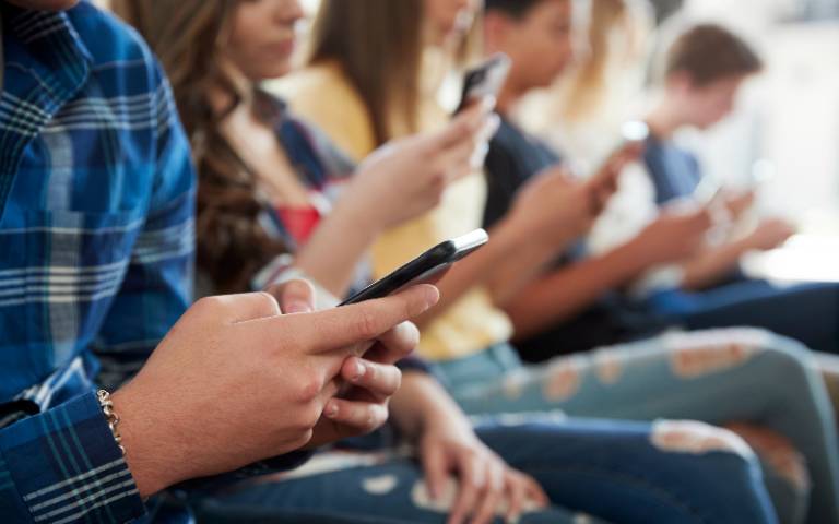 teens on mobile phones