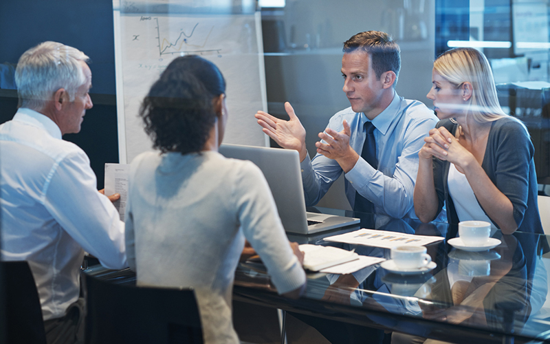 Stock photo of people having a meeting