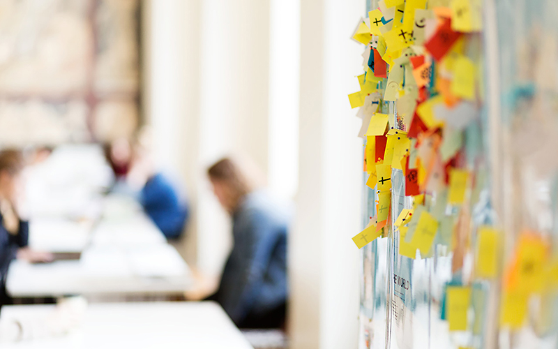 Photo of post-it notes on a board