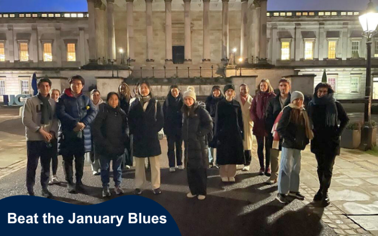 Group of students outside the Portico during a winter walk at sunrise