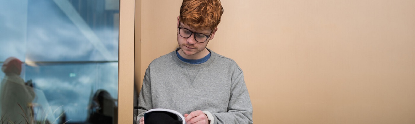 Student reading a book